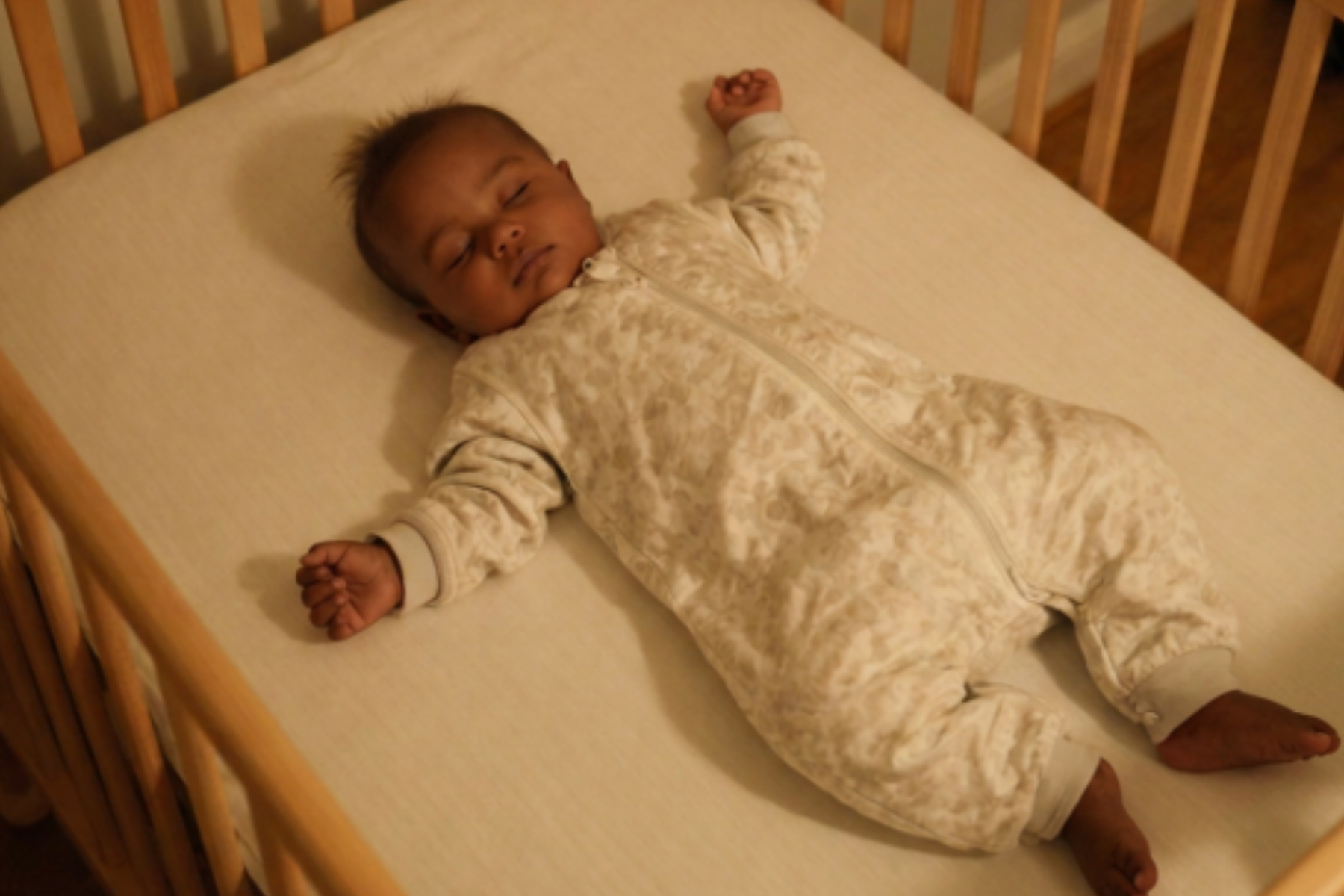 Baby sleeping peacefully in crib